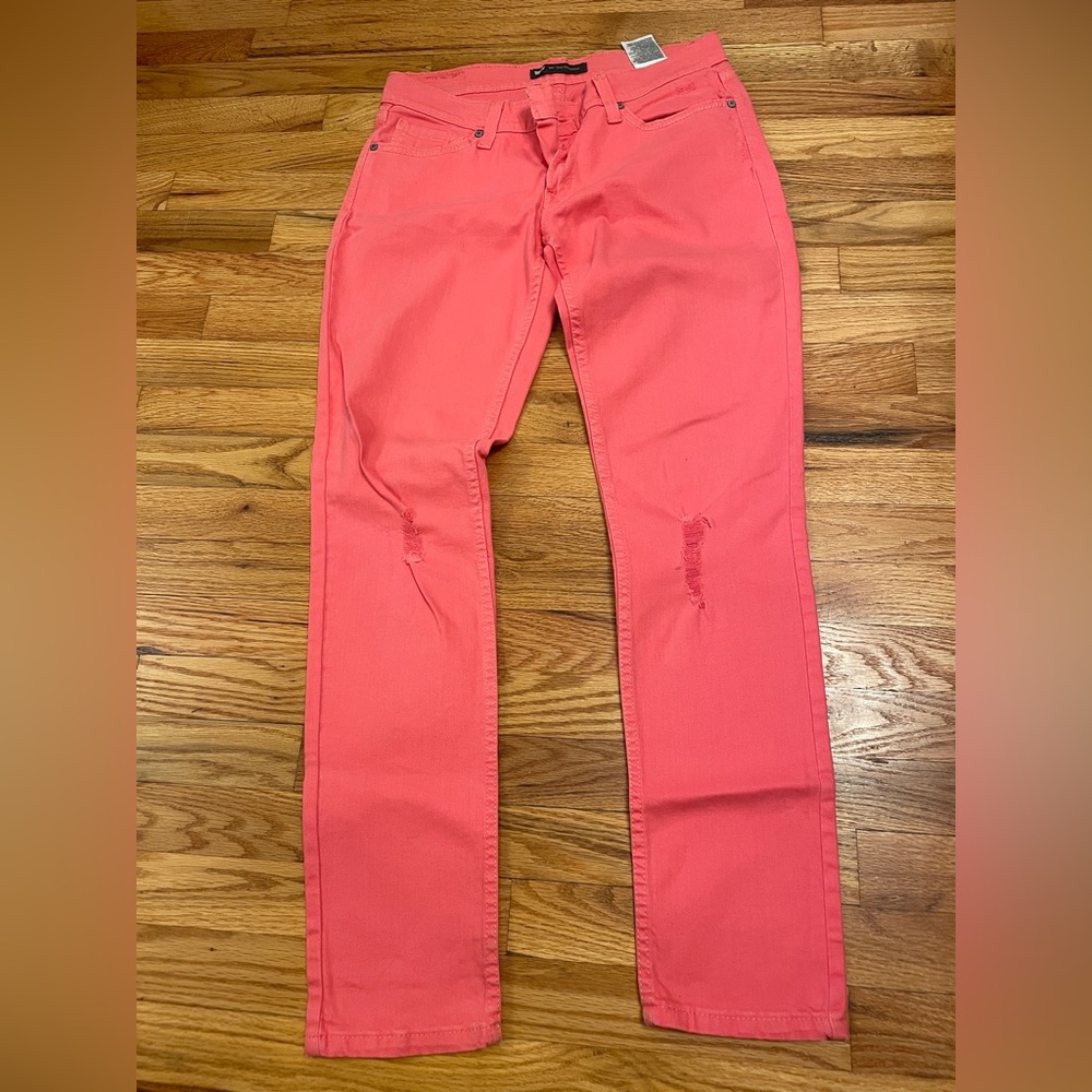 Levi’s 524 dark coral jeans.